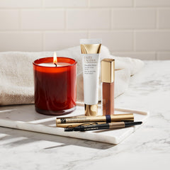 Estée Lauder Brow Multi-Tasker spooled brush styling and setting the brows