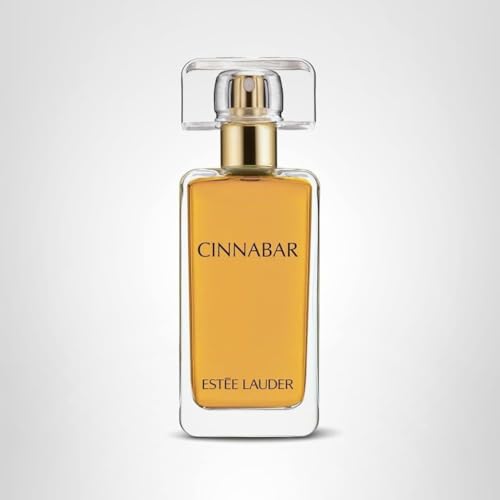 Estée Lauder Cinnabar bottle with amber hues and smooth silhouette.