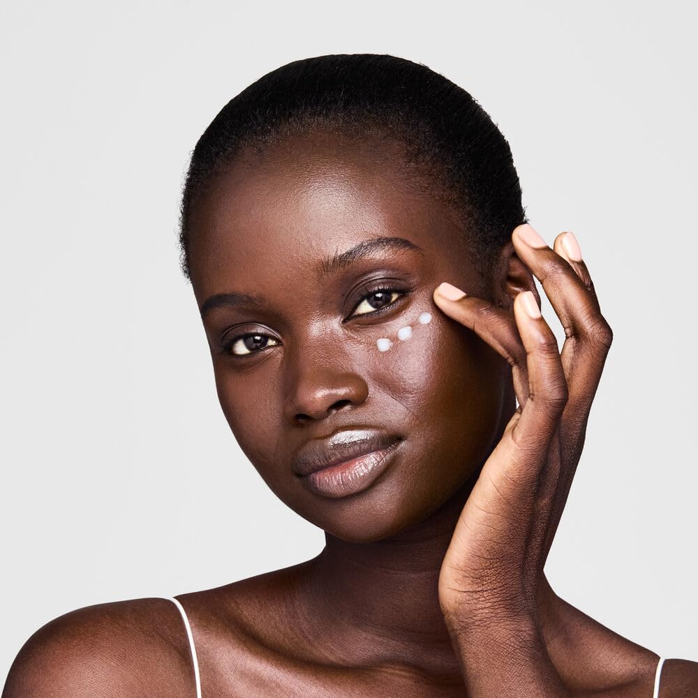 Estee Lauder DayWear under-eye cream application demonstrates soothing, lightweight hydration.