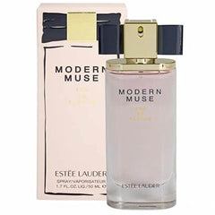 Estée Lauder Modern Muse atomizer closeup, precise spray ideal for evening wear.