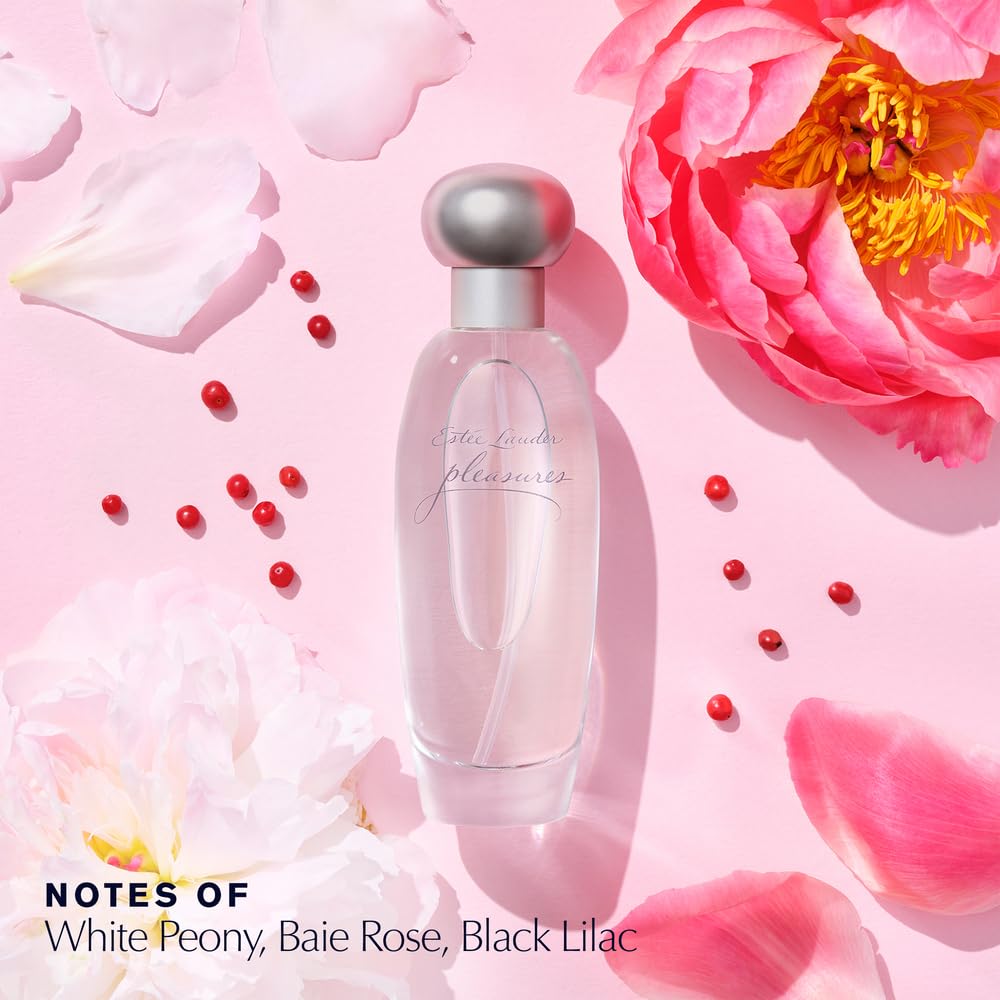 Estée Lauder Pleasures bottle close-up with jasmine, great for evening floral moments.