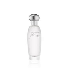 Estée Lauder Pleasures bottle featuring lilies, ideal for fresh daytime wear.