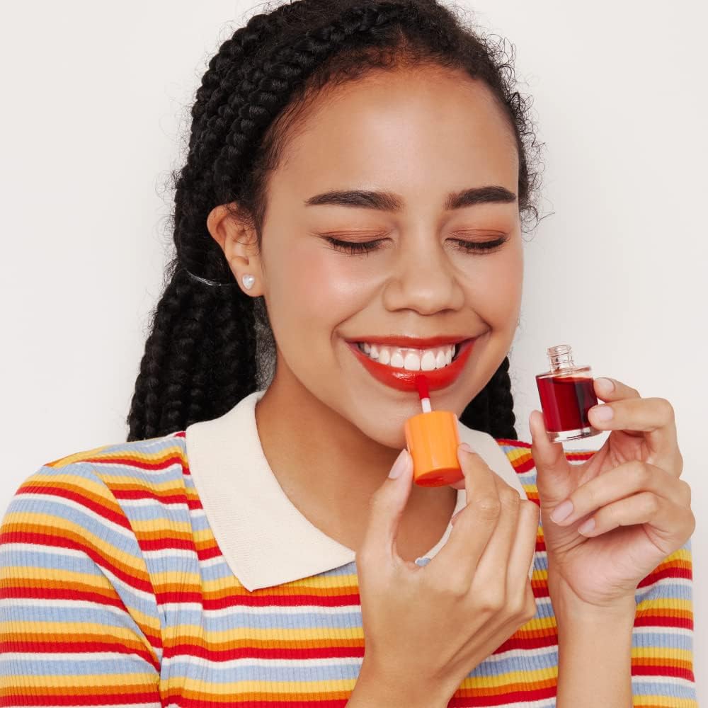 ETUDE Dear Darling Water Tint Orange Ade swatch conveys bold wearable shade.