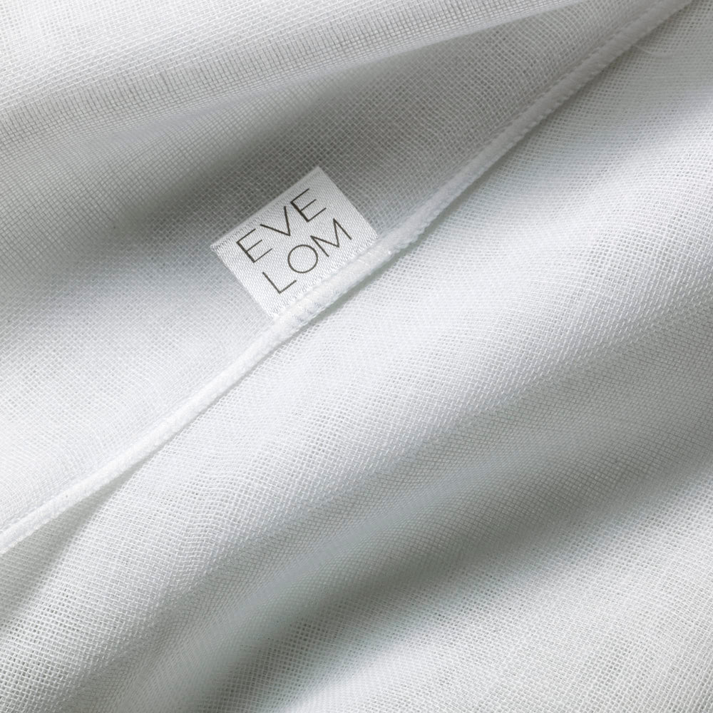 EVE LOM Muslin Cloth being used with cleanser for gentle product removal and refreshed skin.