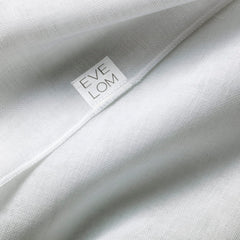 EVE LOM Muslin Cloth being used with cleanser for gentle product removal and refreshed skin.