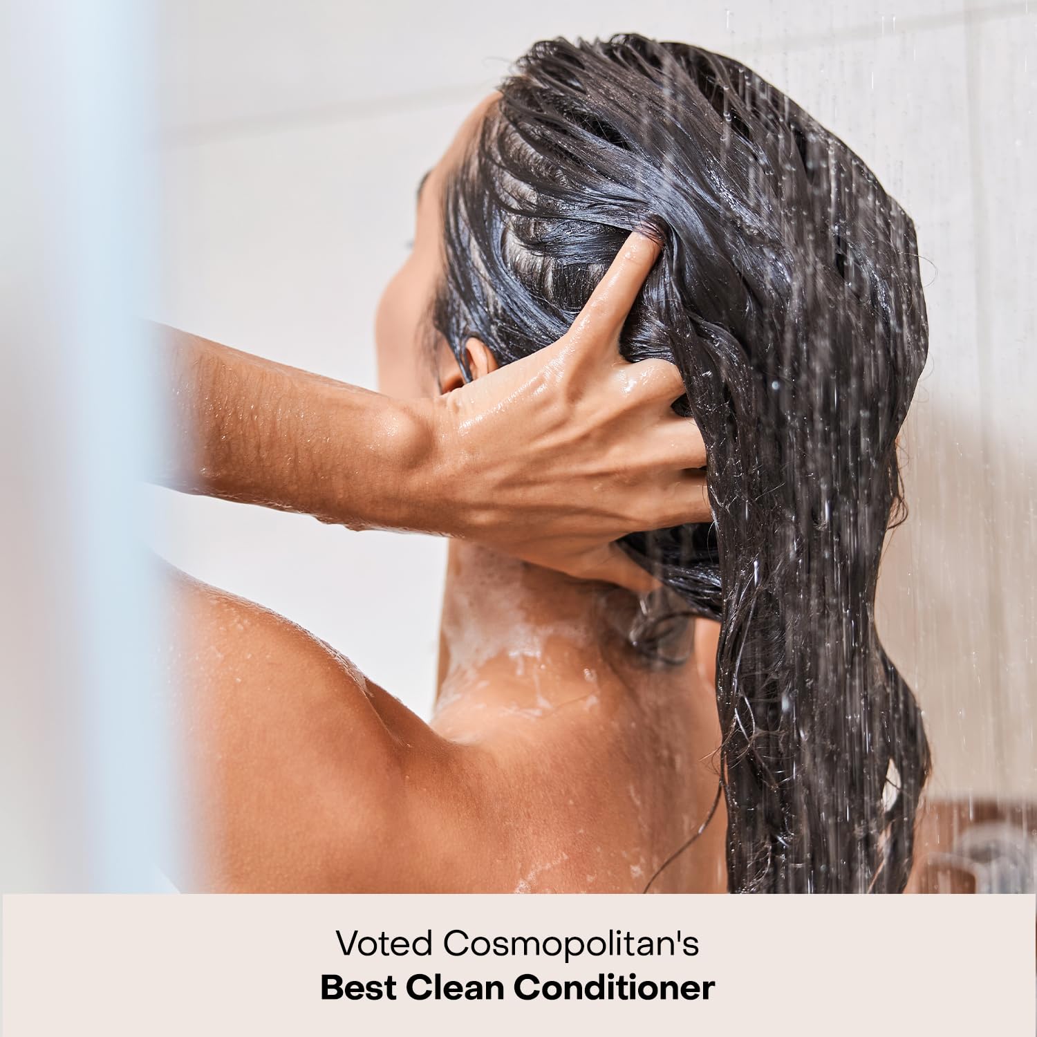 Everist deep conditioner being applied as a nourishing mask.