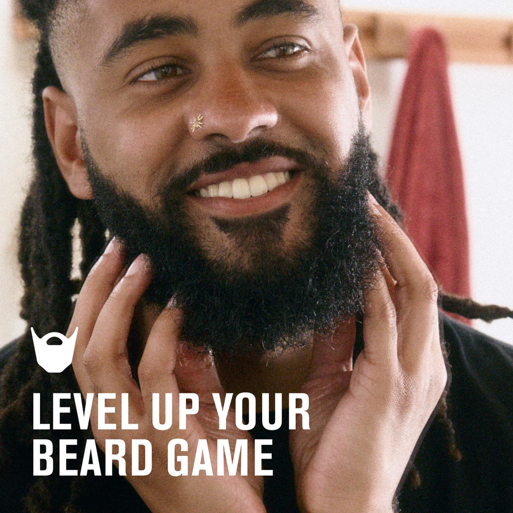 Every Man Jack beard oil label closeup shows premium ingredients.