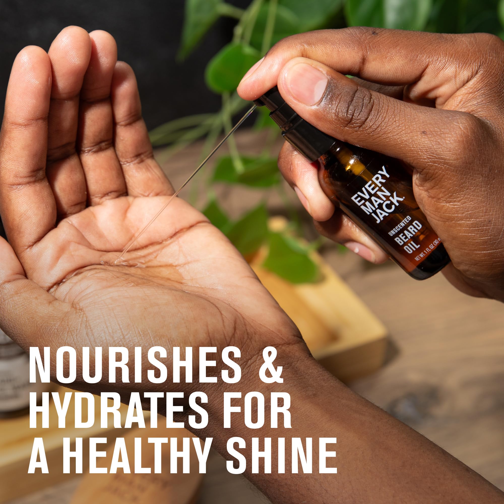 Every Man Jack beard oil vanilla cedar amber glass bottle with natural ingredients cue.