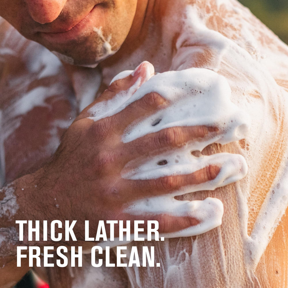 Every Man Jack Nourishing Sea Minerals Citron pump-top bottle in shower setup.
