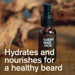 Every Man Jack sandalwood beard oil being poured for easy application