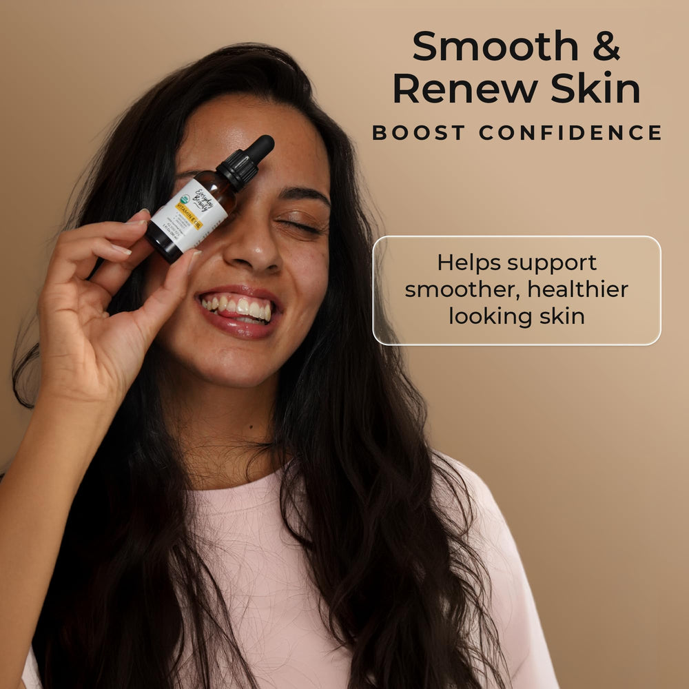 Everyday Beauty Organic Vitamin E Oil texture shows a rich, nourishing blend