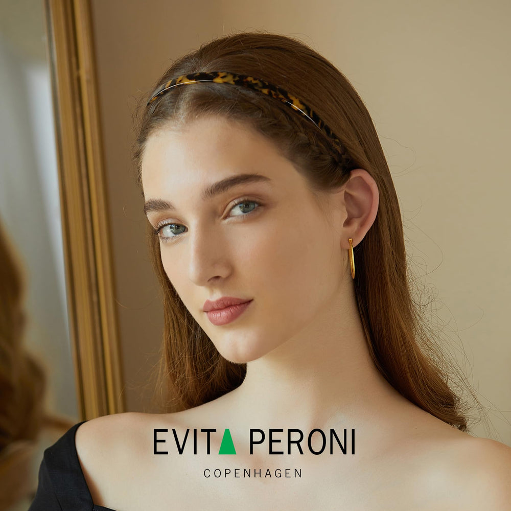 EVITA PERONI U-shaped headband delivers comfortable, no-headache wear during routines