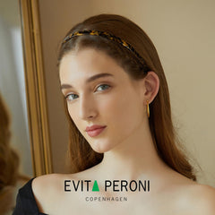 EVITA PERONI U-shaped headband delivers comfortable, no-headache wear during routines