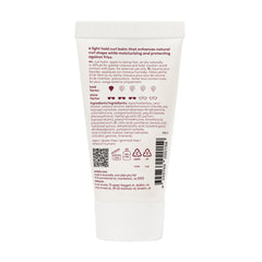 EVO Liquid Rollers Curl Defining Balm label closeup highlighting lightweight formula