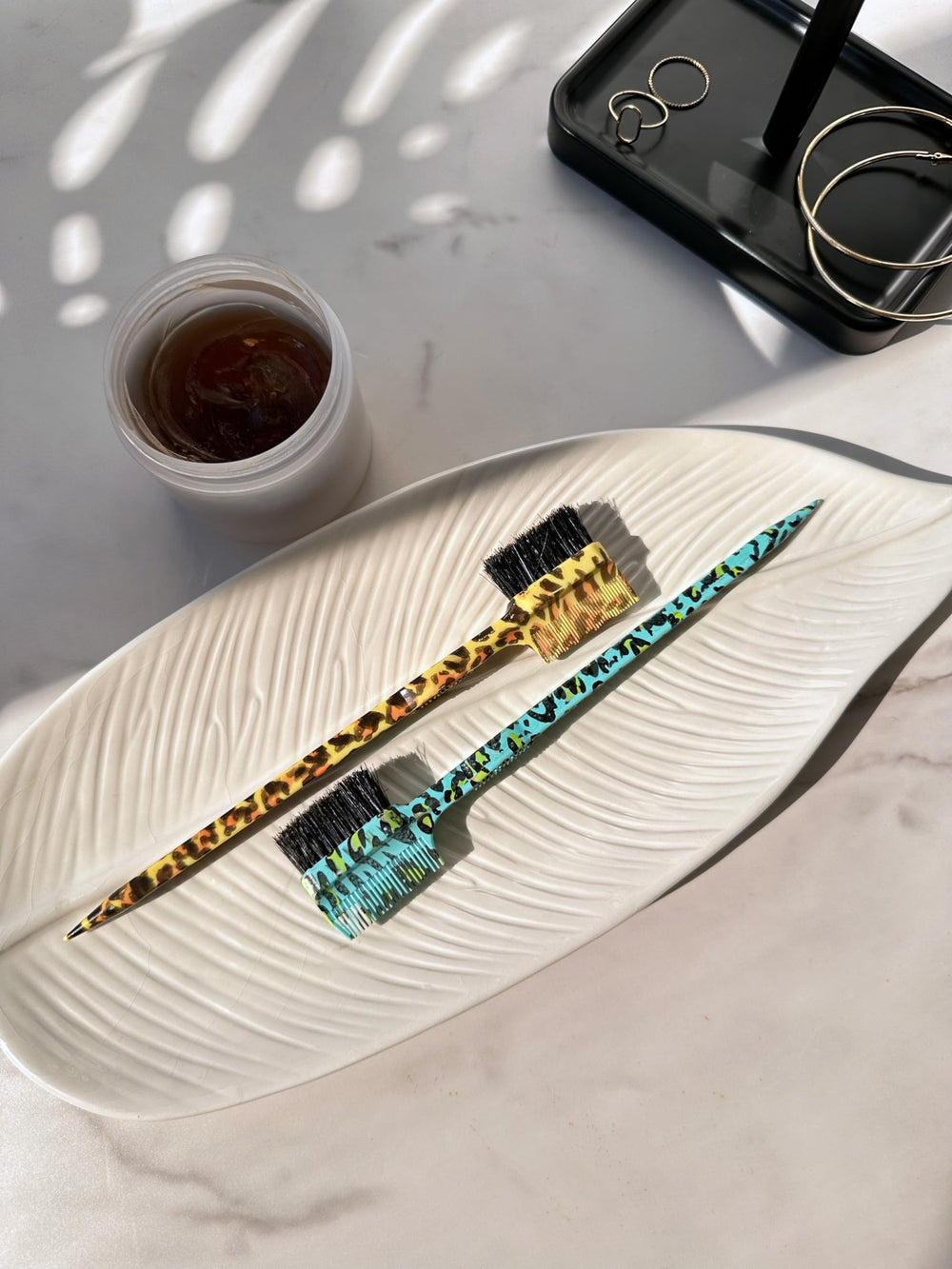 Evolve Triple Edge Styler Brush ideal for quick on-the-go styling.