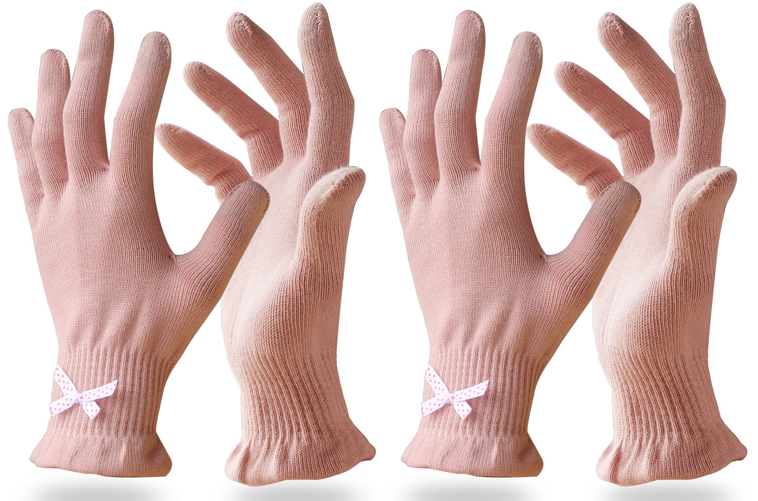 Evridwear pink overnight moisturizing gloves resting beside a nightstand