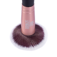 Existing Beauty Bronze Tan Face Detail demonstrates compact size for pinpoint coverage.