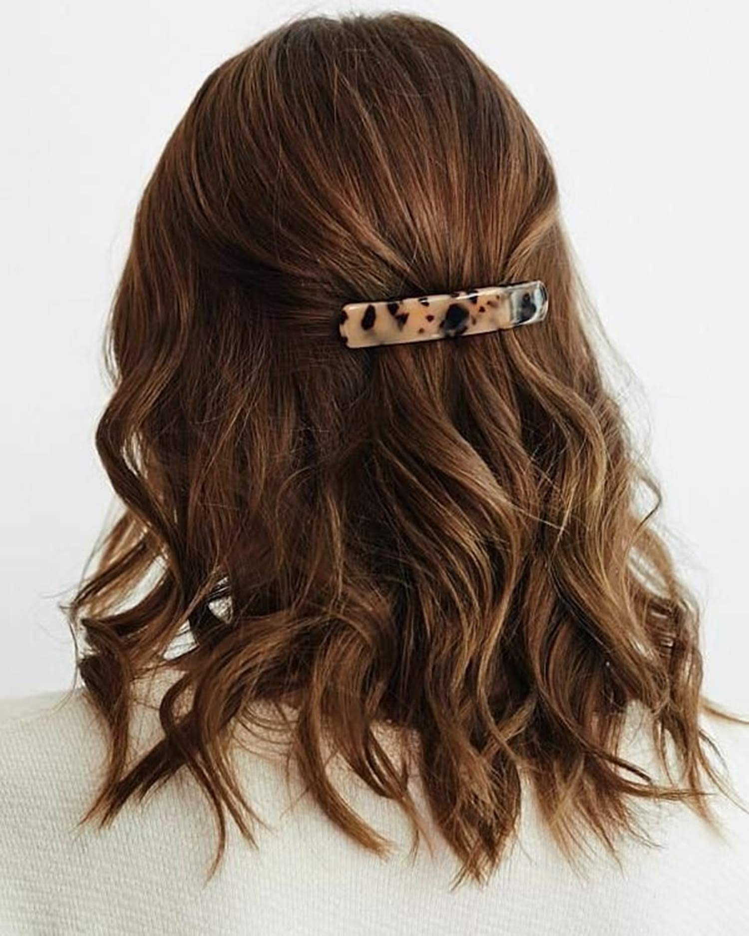 Eyegla tortoise shell rectangle barrette worn on the side for a secure, elegant twist