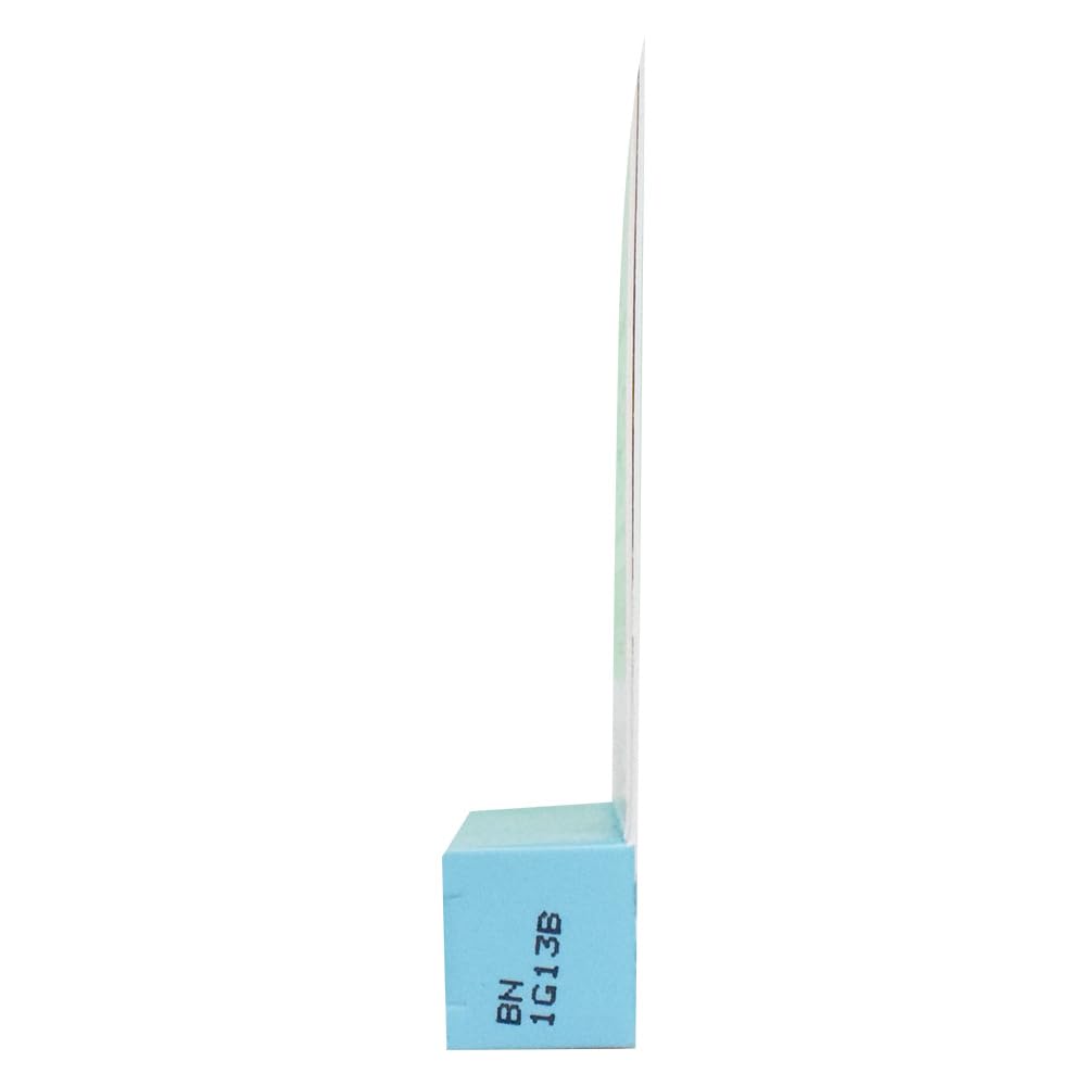Eylure latex-free lash glue applicator brush ready for precise lash band application.