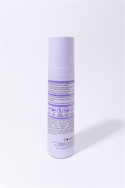 FAB.ME spray action showing mist for quick detangling and frizz control