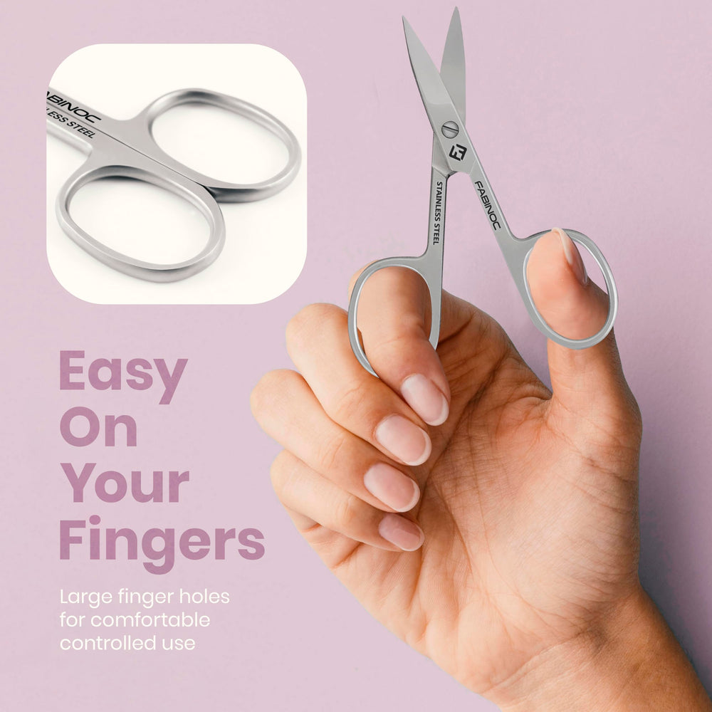 FABINOC curved nail scissors in hand demonstrating control