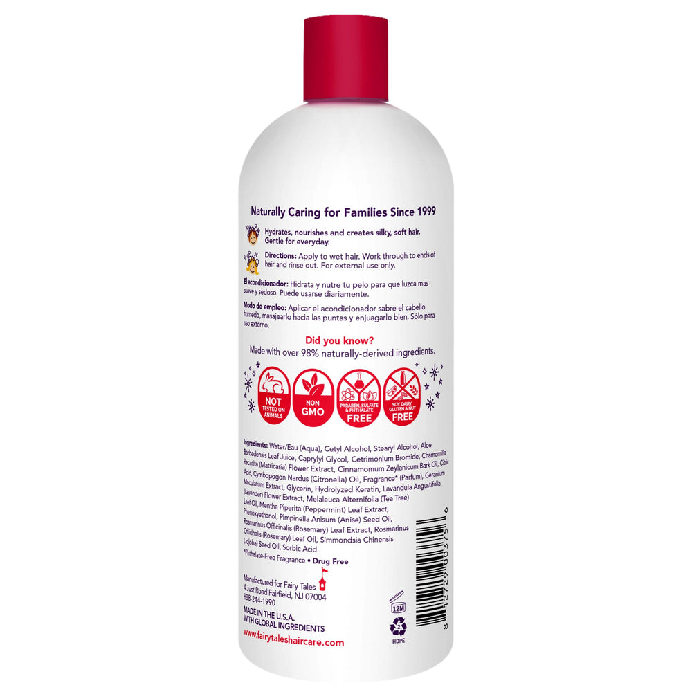 Child applying Fairy Tales Rosemary Repel conditioner to damp hair for easier brushing.