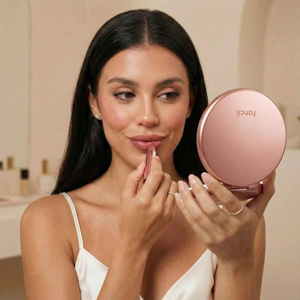 Fancii Lumi rose gold travel mirror open for quick checks