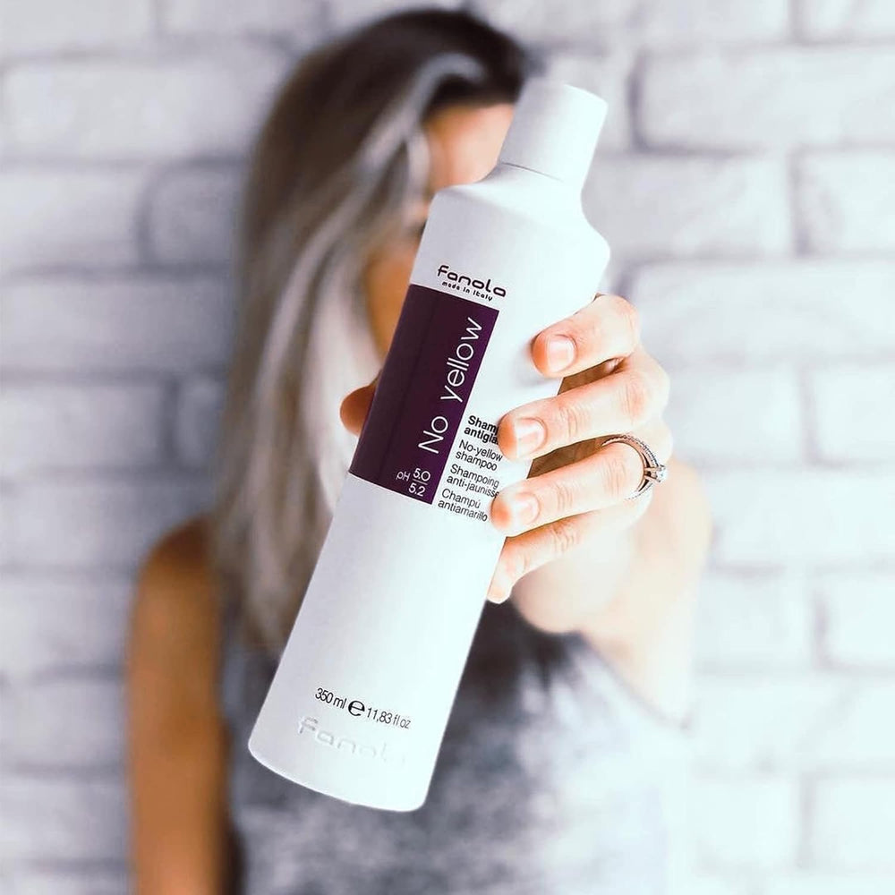 Fanola No Yellow Shampoo foam creates even violet-toned lather for brightness.