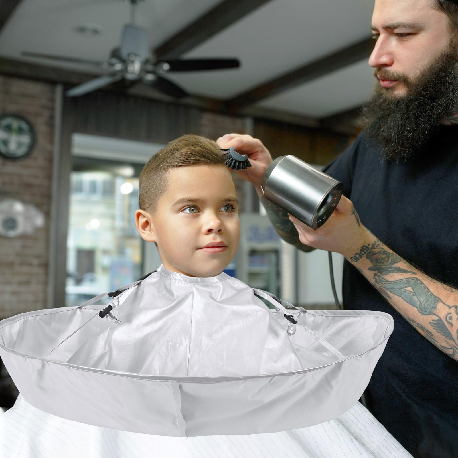 FEBSNOW haircutting cloak includes tail comb and clip for precise setup.