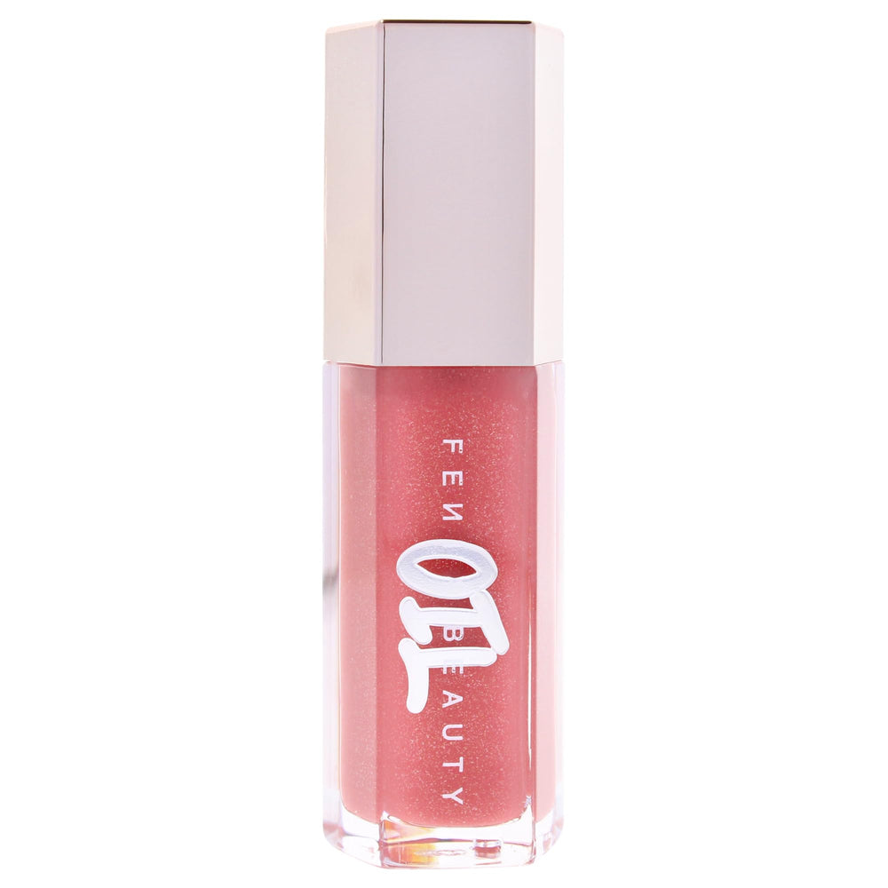 Fenty Beauty Gloss Bomb Lip Oil swatches showing rosy pink glow.