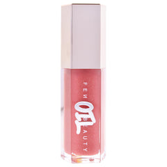 Fenty Beauty Gloss Bomb Lip Oil swatches showing rosy pink glow.