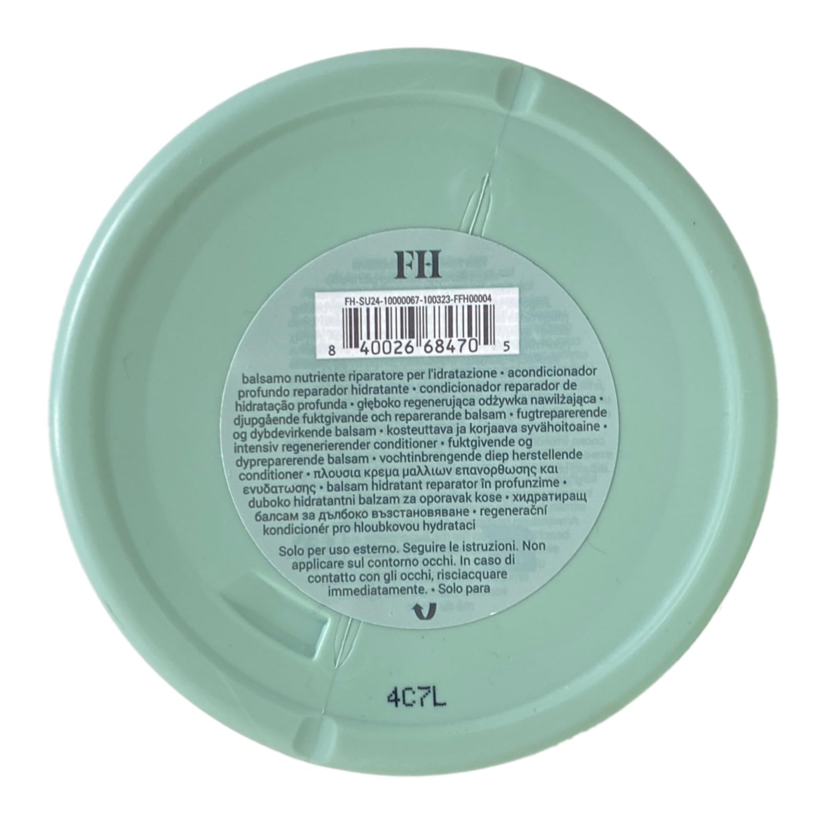 Fenty Hair The Richer One application closeup shows slip for easier detangling.