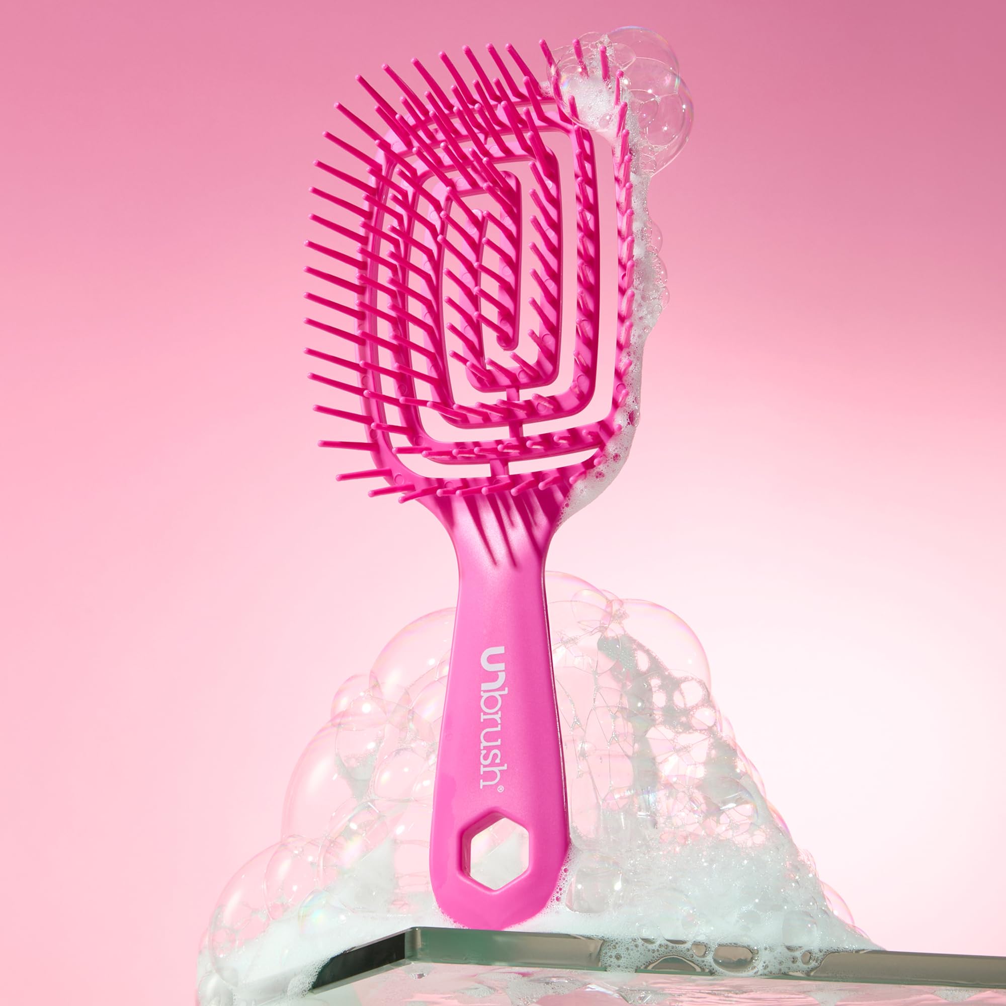 FHI Heat UNbrush Flex shower-friendly detangler for quick styling.