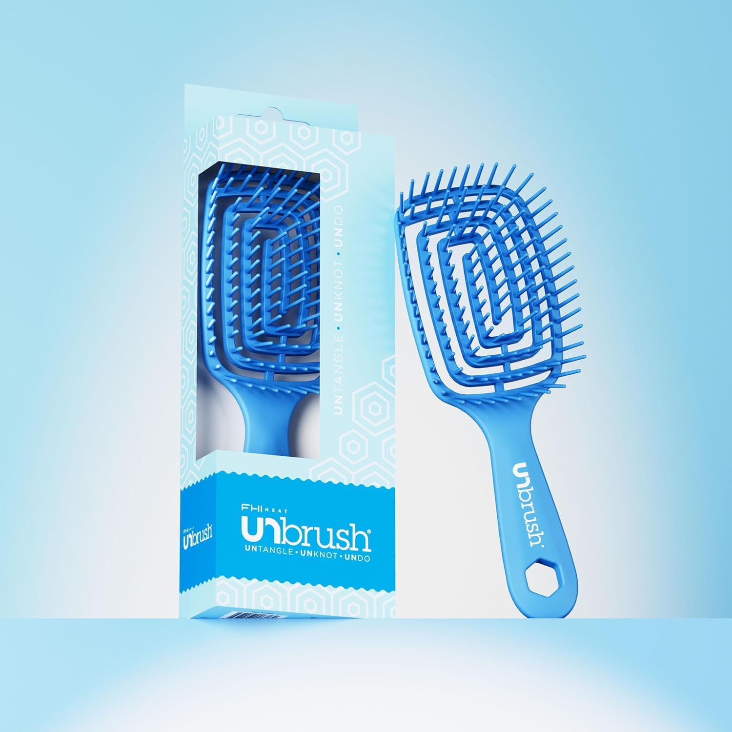FHI Heat UNbrush Flex spiral DuoFlex bristles on hair for smooth detangling.