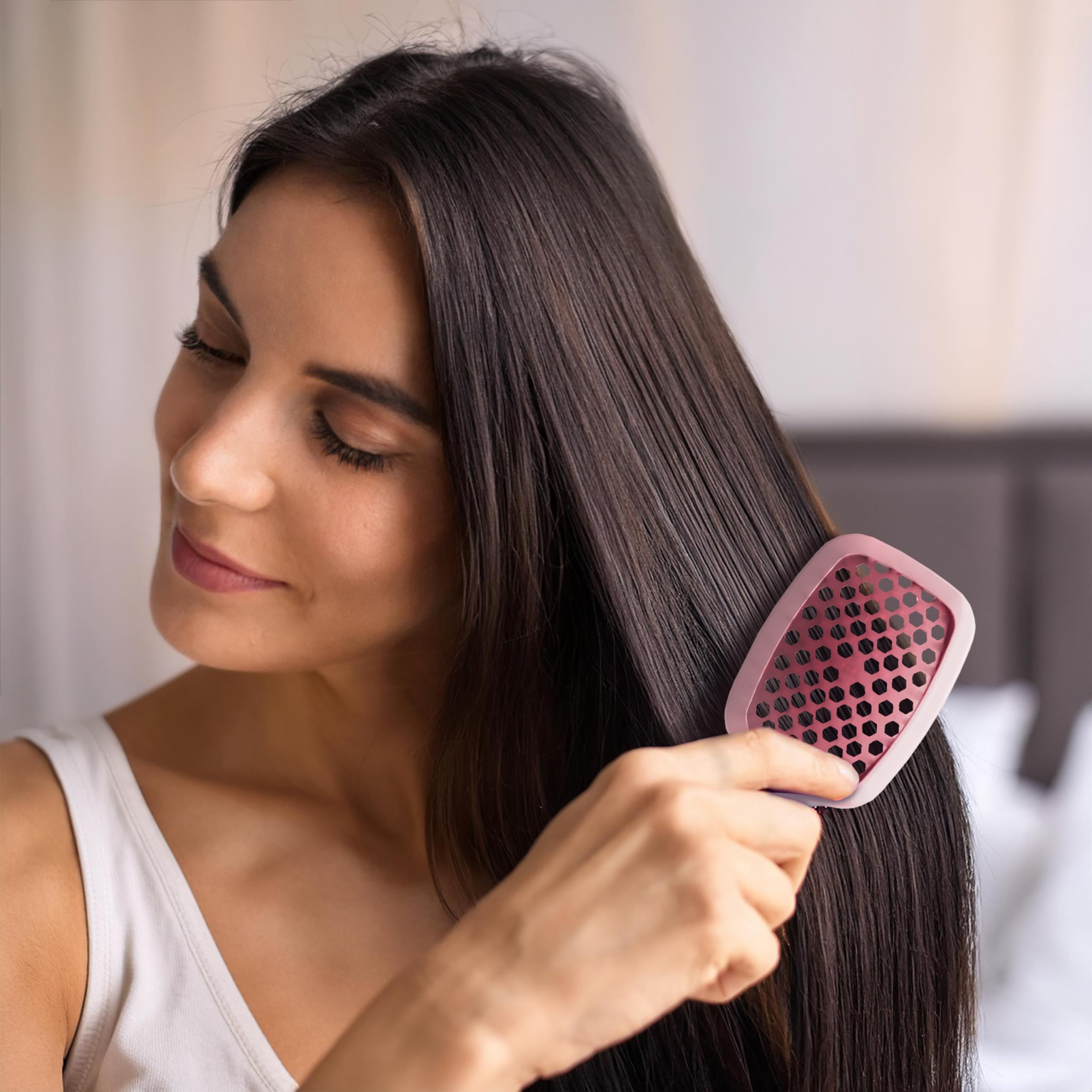 47 long bristles reach knots near the scalp for smooth results