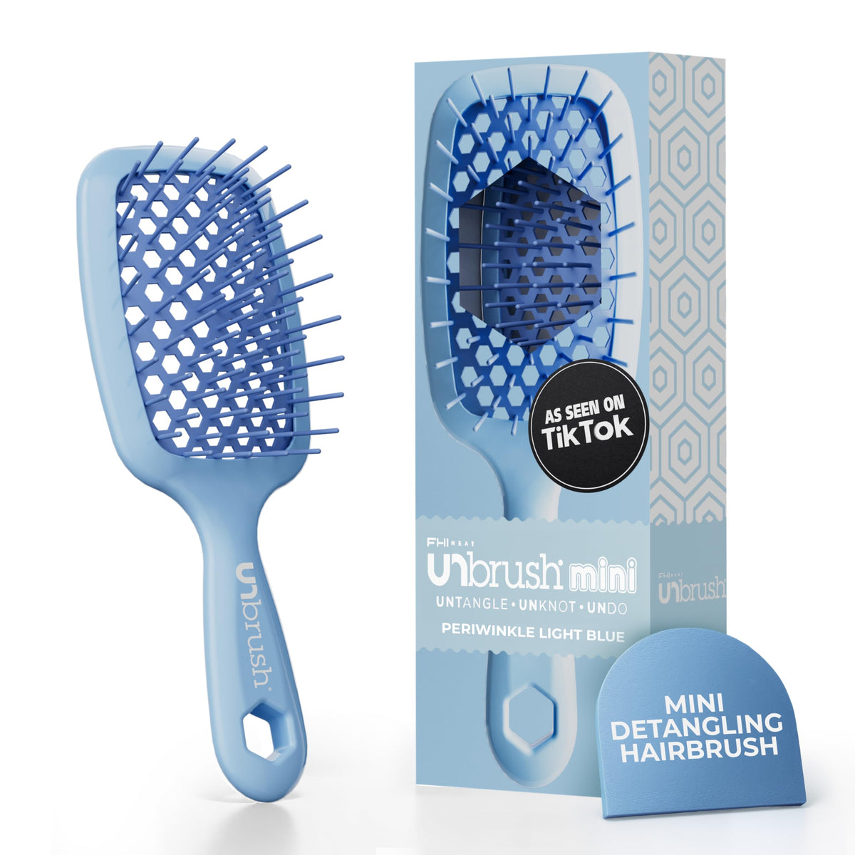 FHI Heat UNbrush Mini Detangler Brush front view, travel-ready for painless detangling