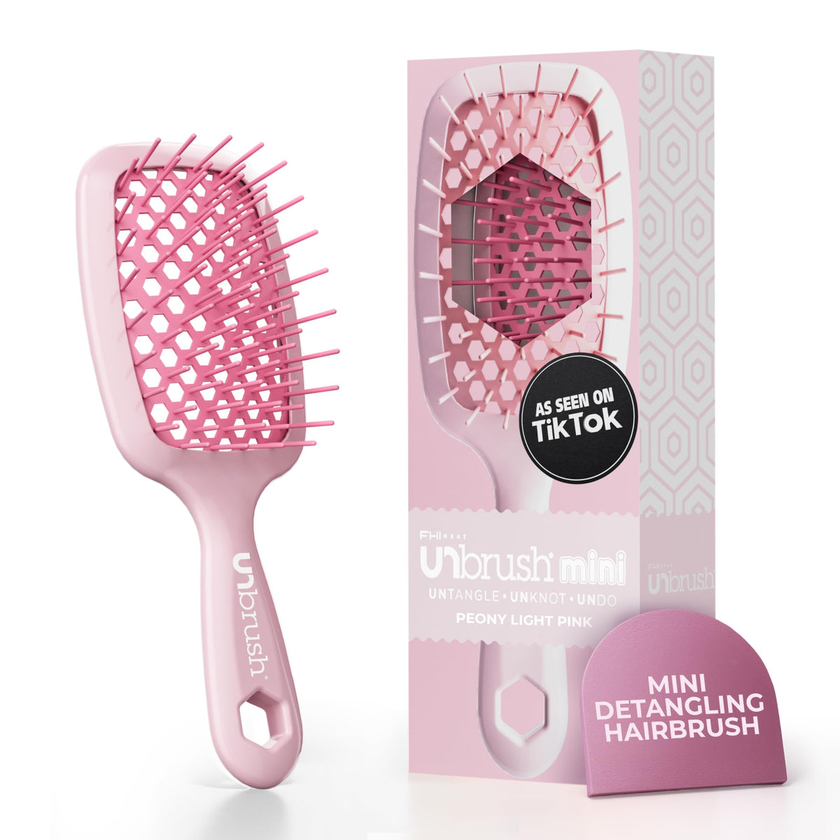 FHI Heat UNbrush Mini Detangler Brush with peony pink handle eases detangling for all hair types