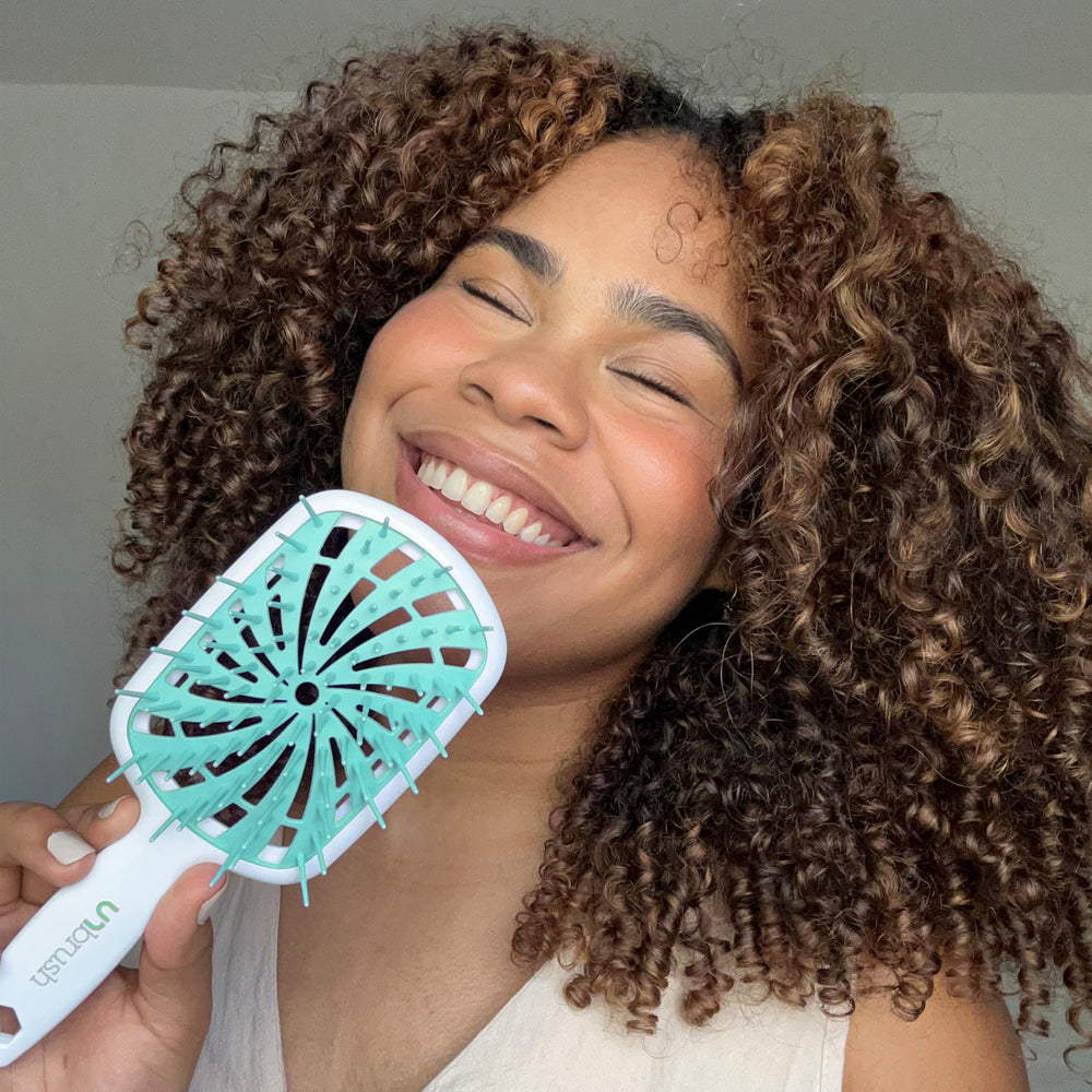 FHI Heat UNbrush Plus designed for wet and dry hair detangling with minimal pulling