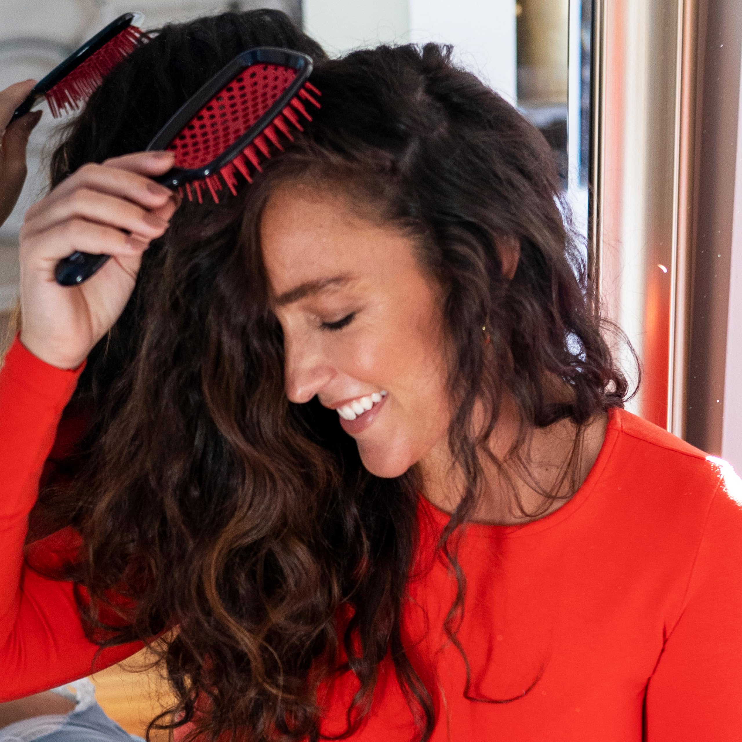 FHI Heat UNbrush red travel-case ready for on-the-go detangling