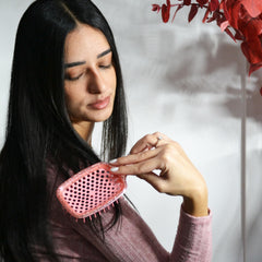 FHI Heat UNbrush Ruby Peach bristle types close-up displays 58 long bristles for smooth detangling.
