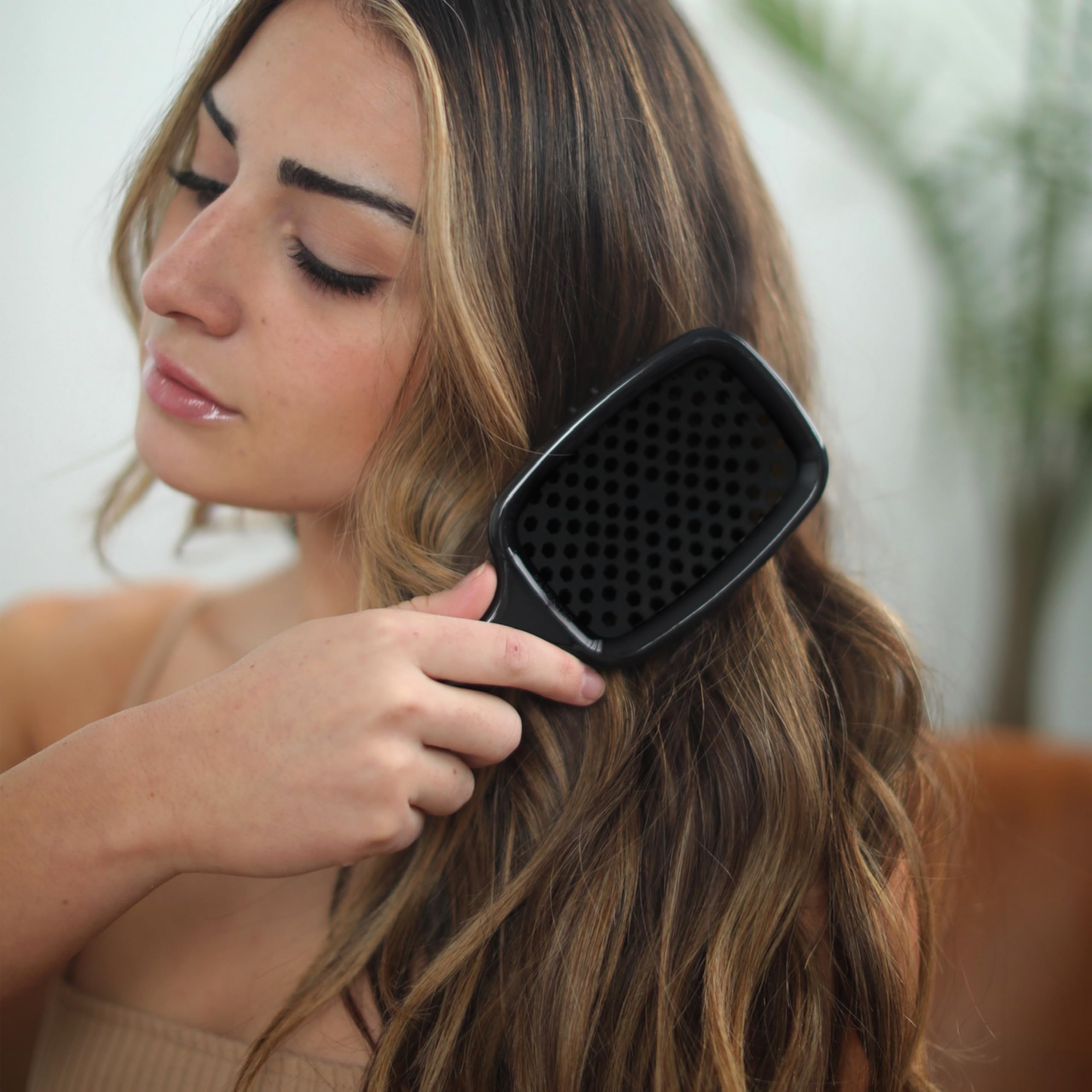 FHI Heat UNbrush on wet hair for gentle detangling.