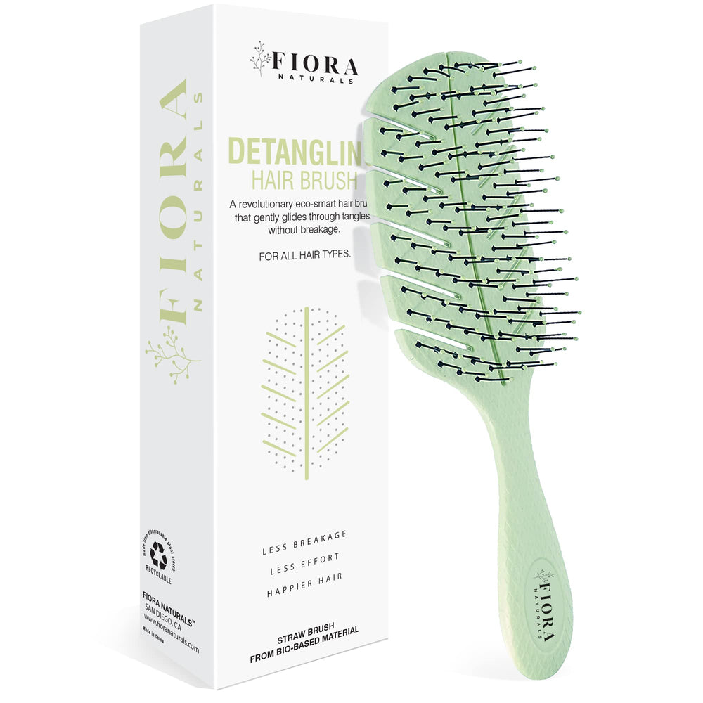 Fiora Naturals ergonomic-handle detangler brush provides comfortable grip and control.