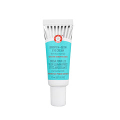 First Aid Beauty Brighten + Glow Eye Cream bottle close-up showing hydration and glow