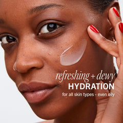 Close-up texture of First Aid Beauty gel cream showing light non-greasy finish.