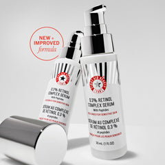 First Aid Beauty retinol complex serum label detail highlighting fragrance-free and paraben-free benefits