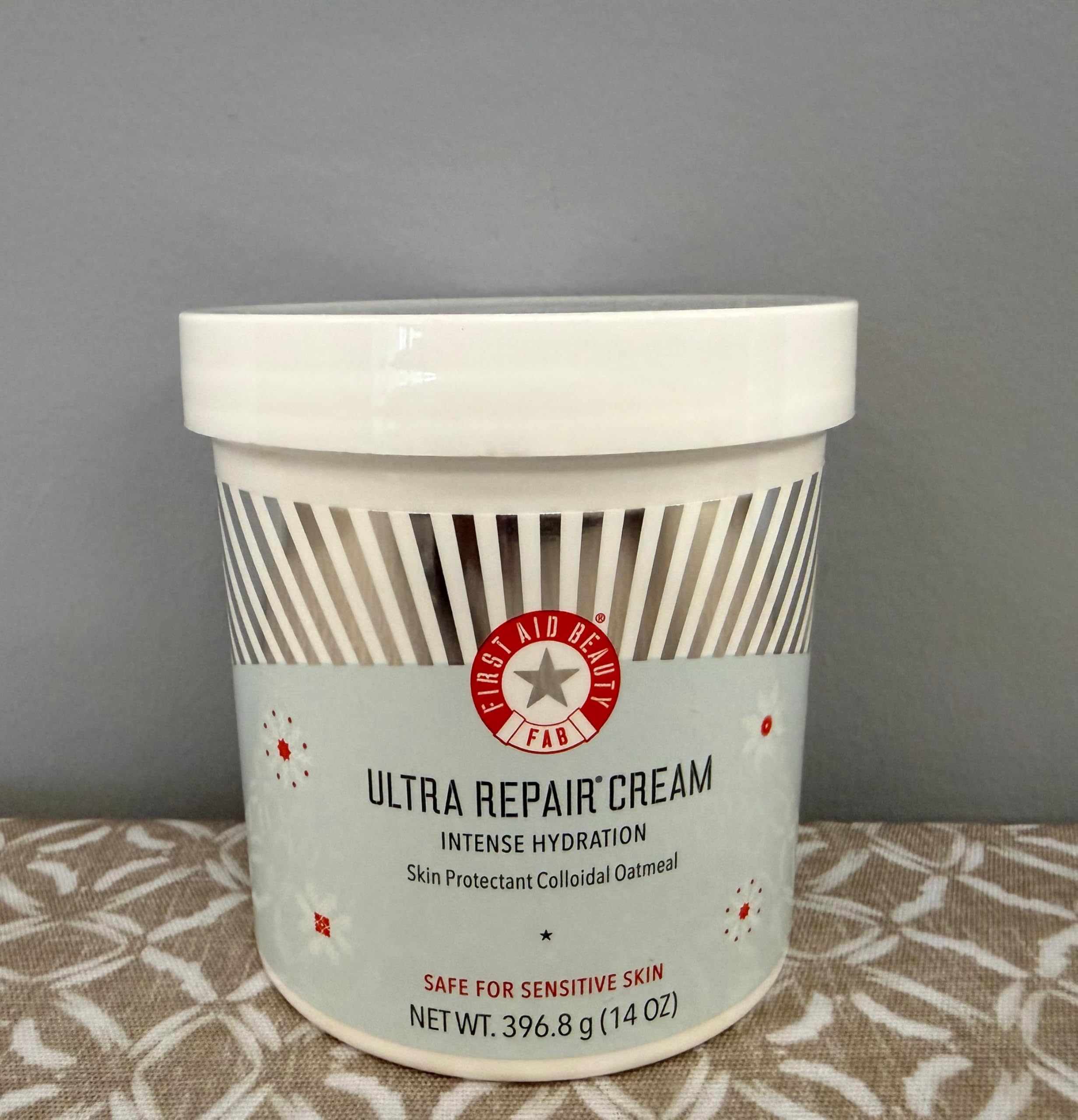 First Aid Beauty Ultra Repair Cream on bathroom shelf for daily use