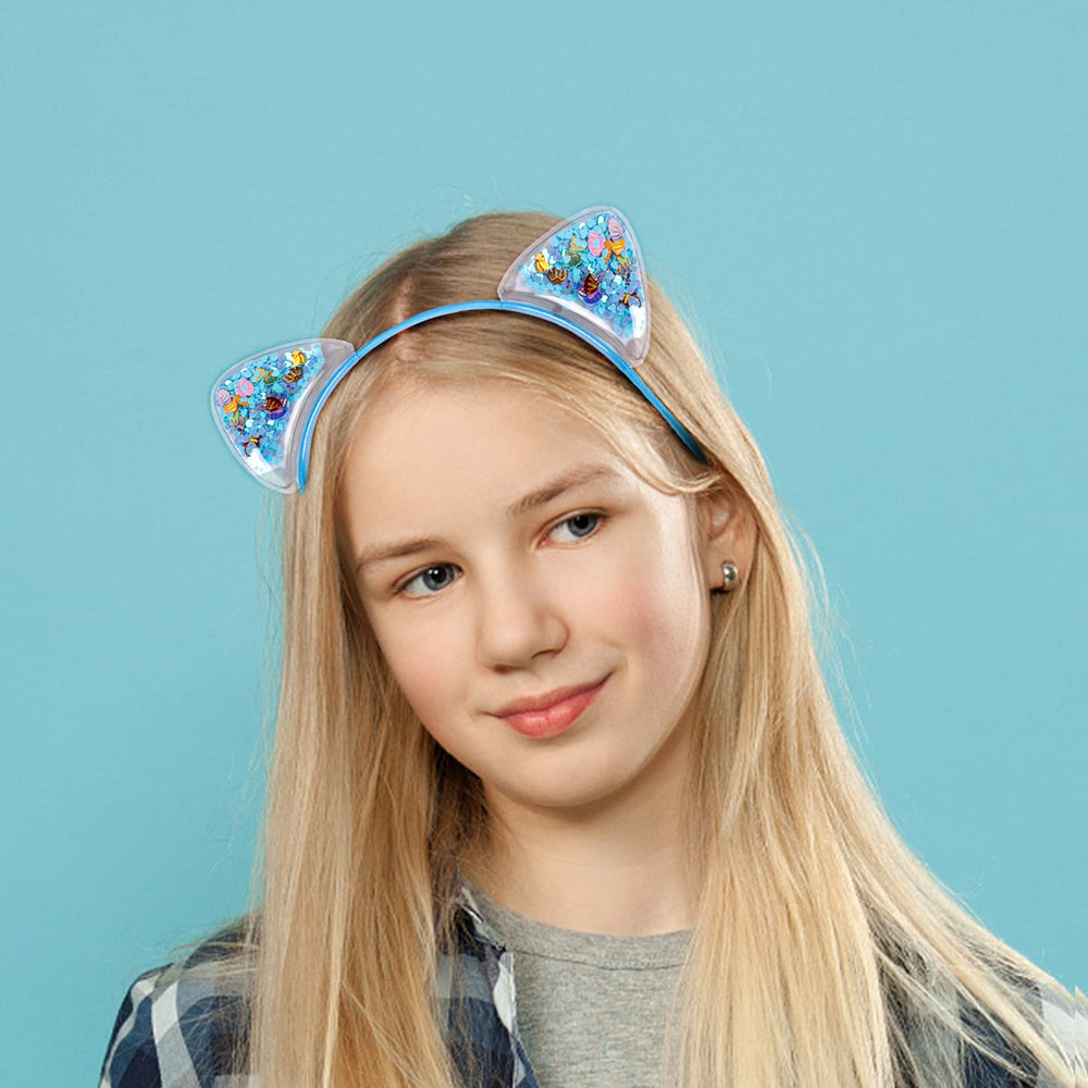 Fishdown purple headband with multicolor stars and seashells for versatile wear.