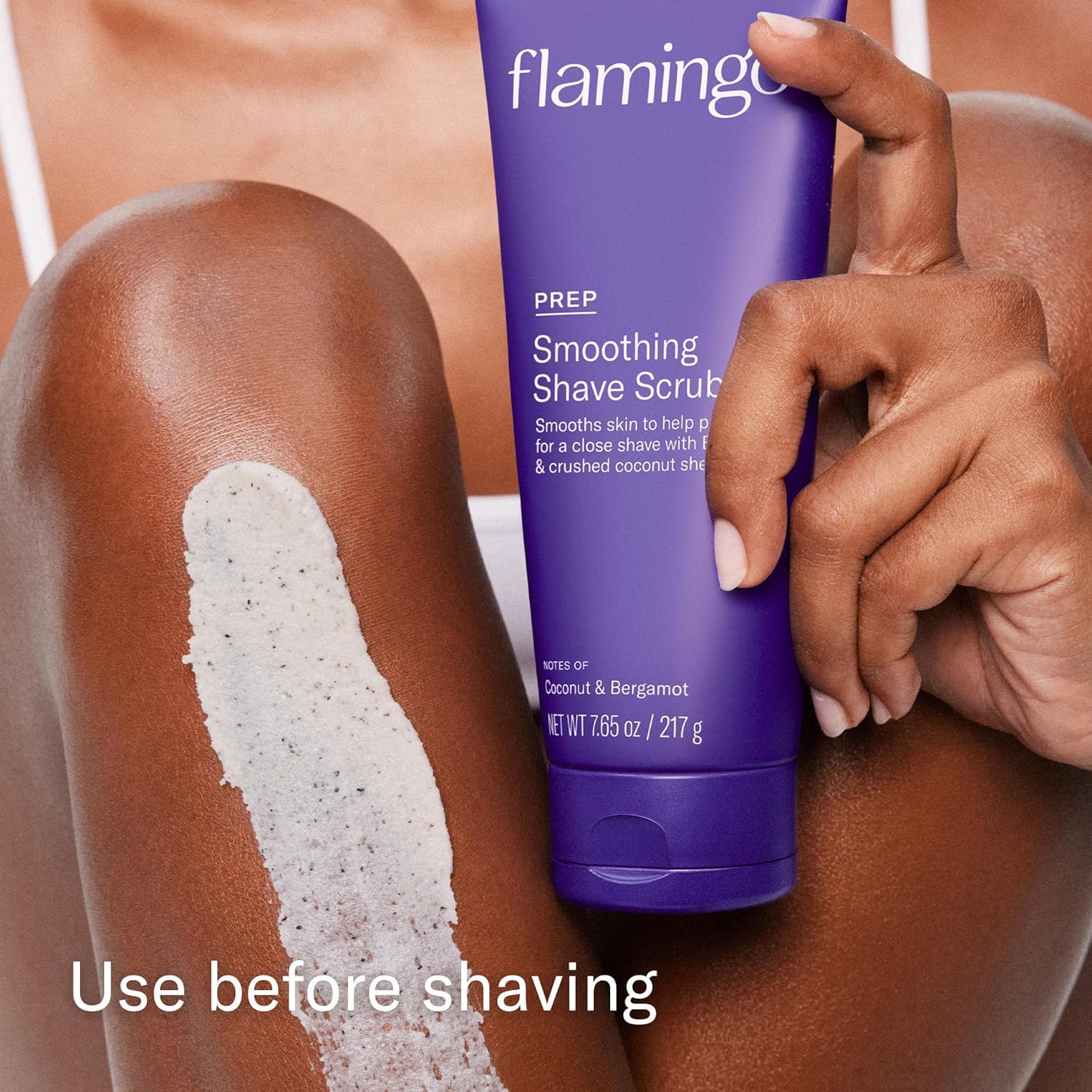 Flamingo Glow Shave Pre-Scrub with crushed coconut shell exfoliants.