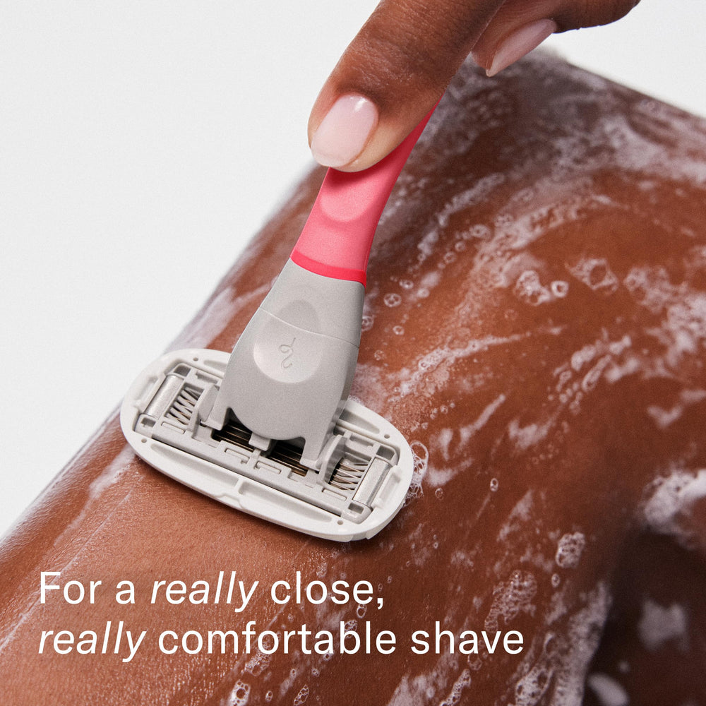 Flamingo shower holder keeps razor accessible and dry.