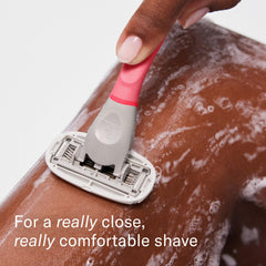 Flamingo shower holder keeps razor accessible and dry.